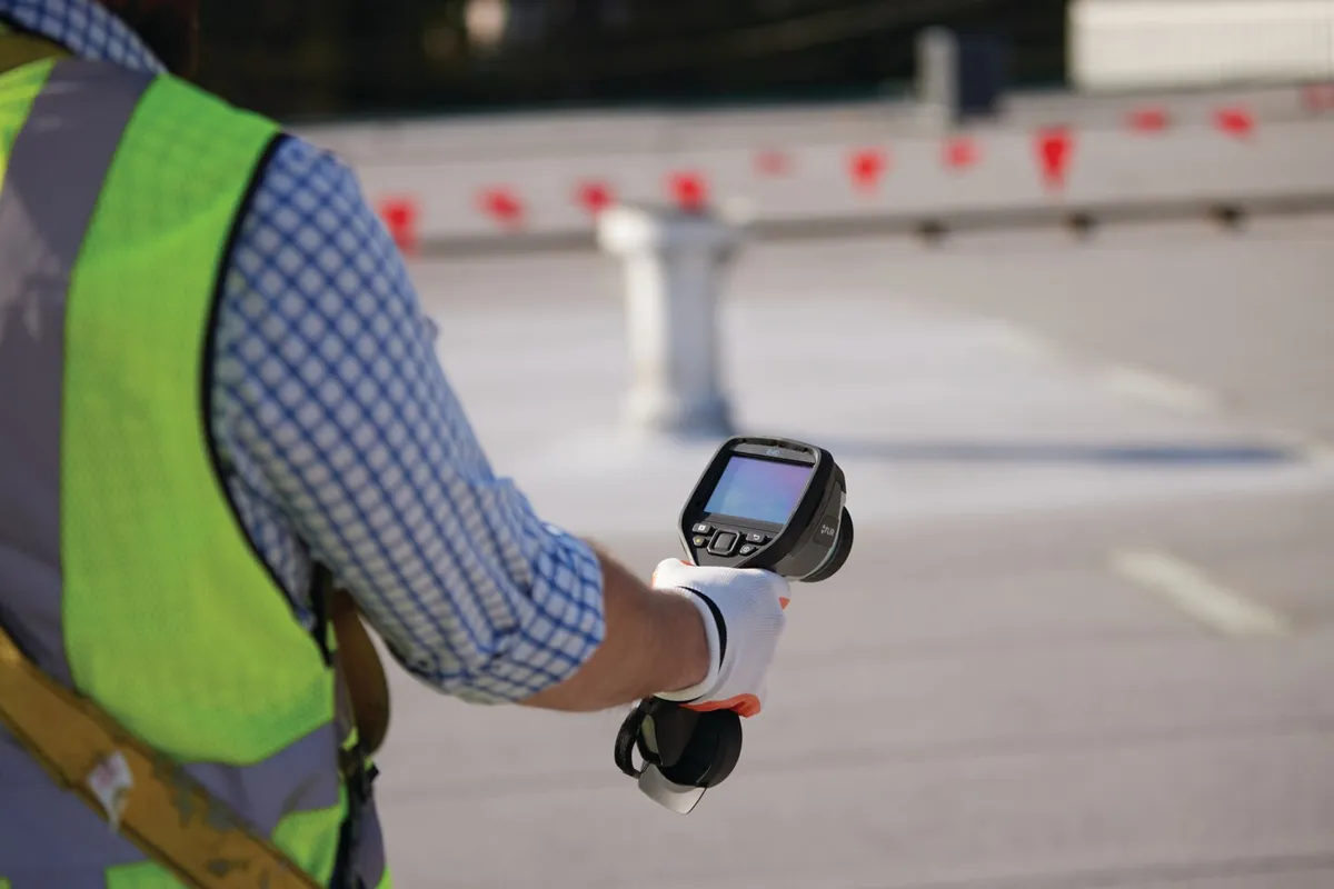 Roof moisture scan with a thermal imaging camera on a commercial roof