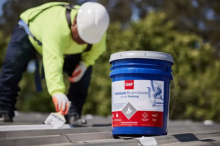 Roof penetration being detailed with mastic and fabric
